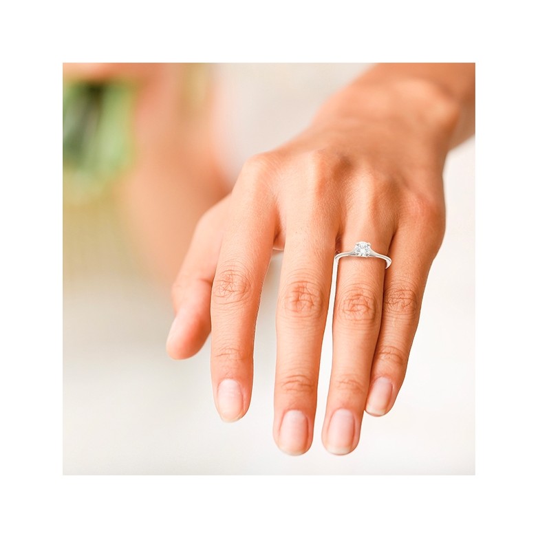 Solitaire diamant 0.50 carat en or blanc