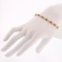 Bracelet perles dâ€™émeraudes, de rubis et saphirs en or jaune