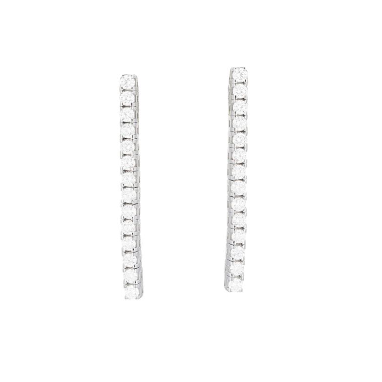 Boucles d'oreilles or gris diamant (s) signé