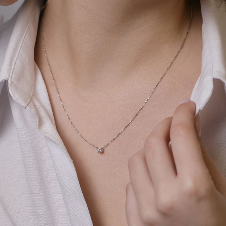 Collier or gris diamant (s) 
