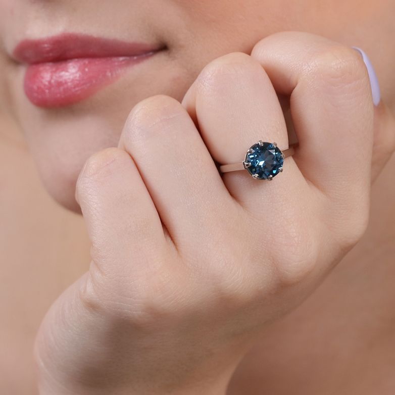 Bague Platine diamant,P.fine Topaze traitée "London blue"