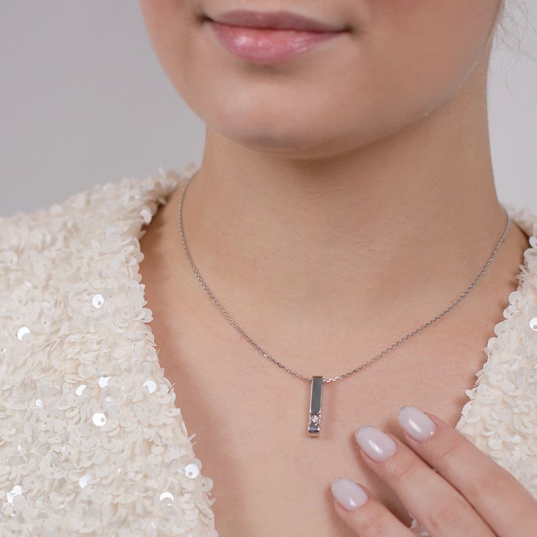 0.09 carat white gold...
