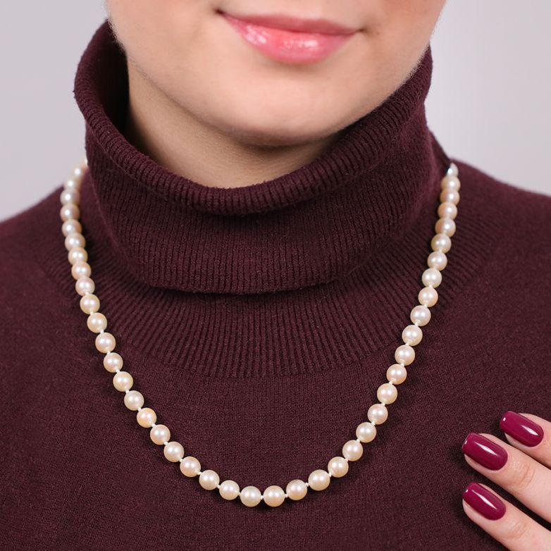 Yellow gold choker pearl...