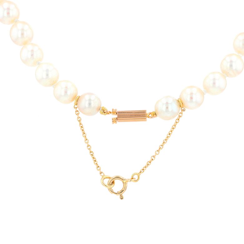 Yellow gold choker pearl...