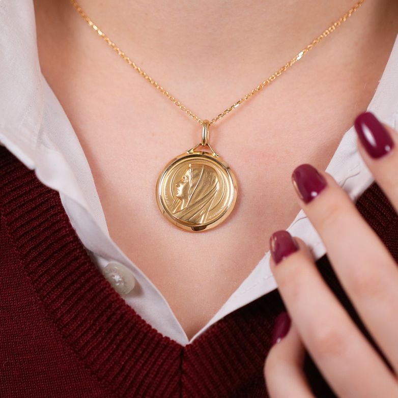 Vierge medal in yellow gold...