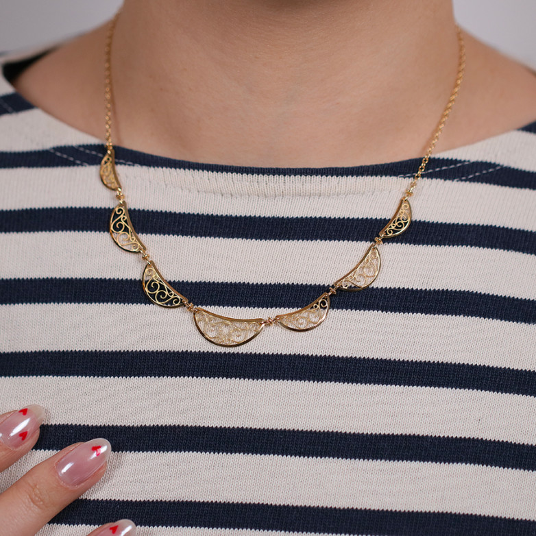 Yellow gold filigree mesh...