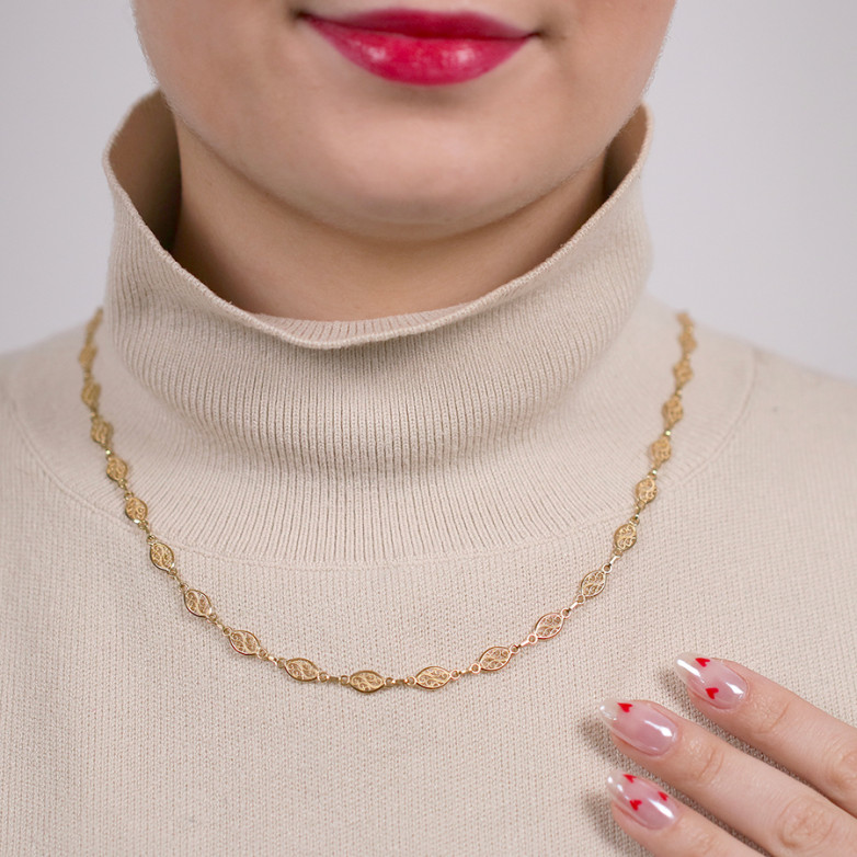 Yellow gold filigree mesh...