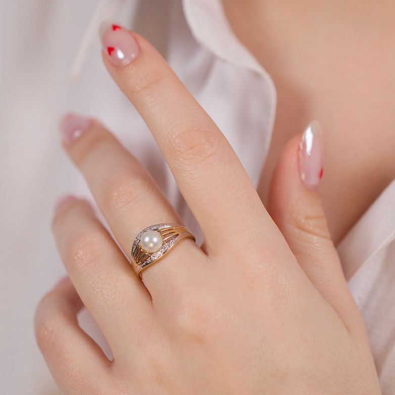 Diamond pearl ring 0.03...
