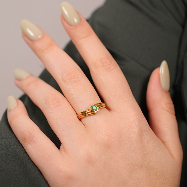 Ring emerald 0.18 carat and...