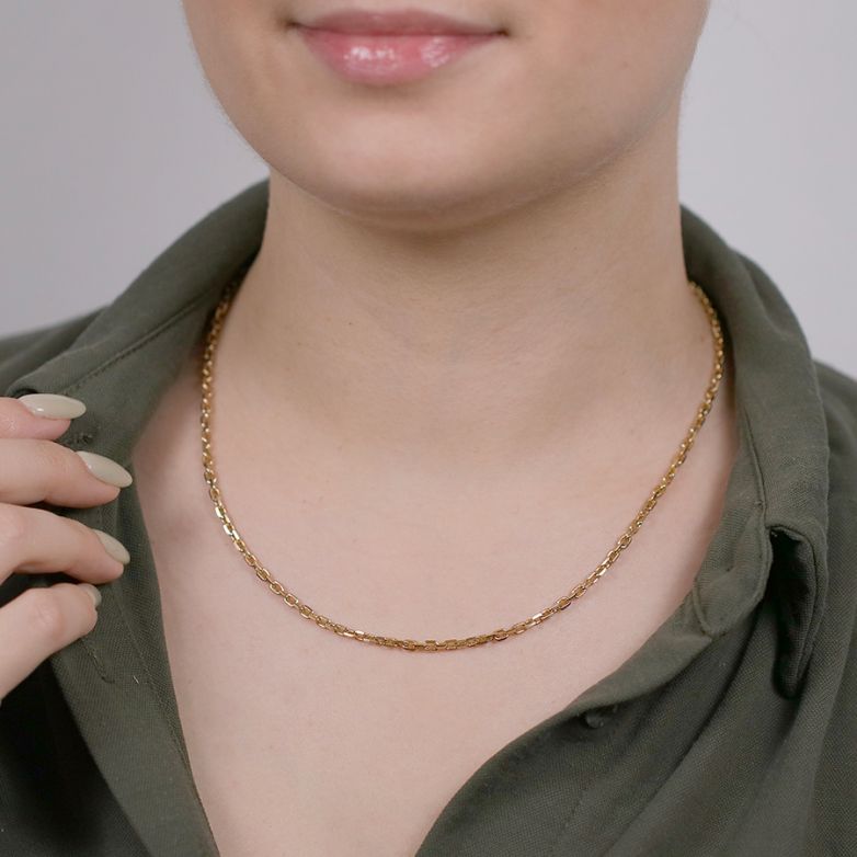 Yellow gold forçat chain...