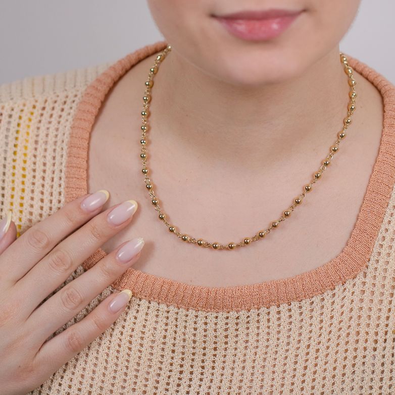11.24g yellow gold ball...