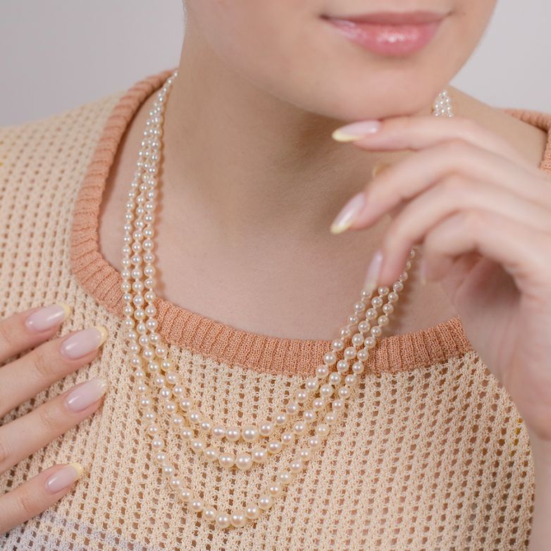 Triple strand yellow gold...