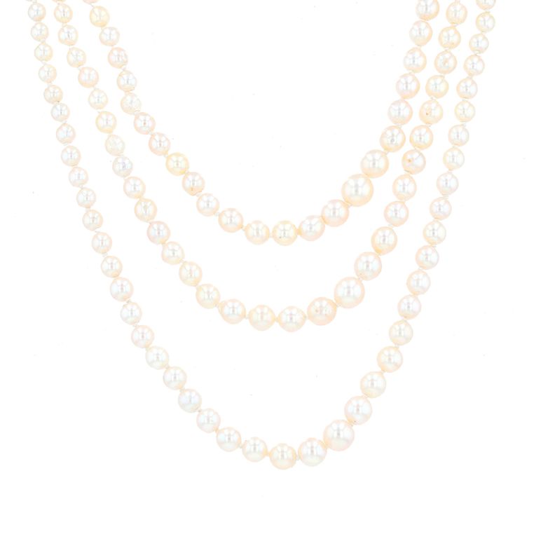 Triple strand yellow gold...