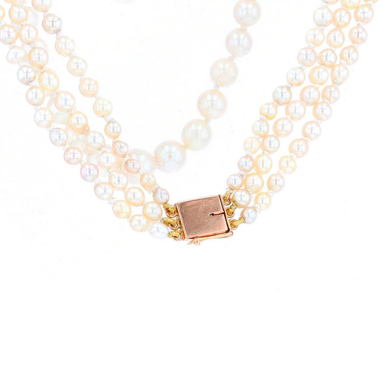 Triple strand yellow gold...