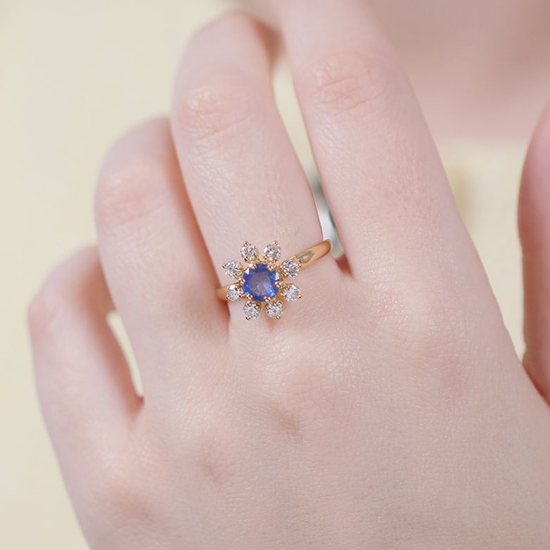 Ring daisy sapphire 1.09...