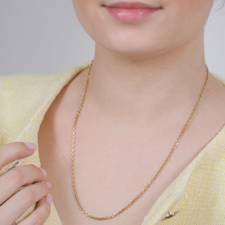 Yellow gold forçat chain...
