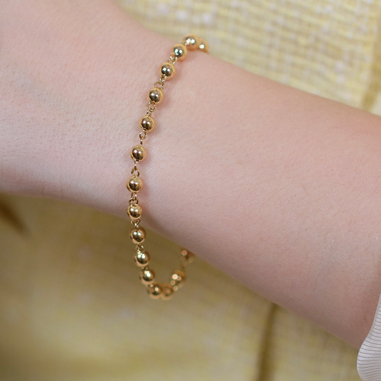Yellow gold ball link...