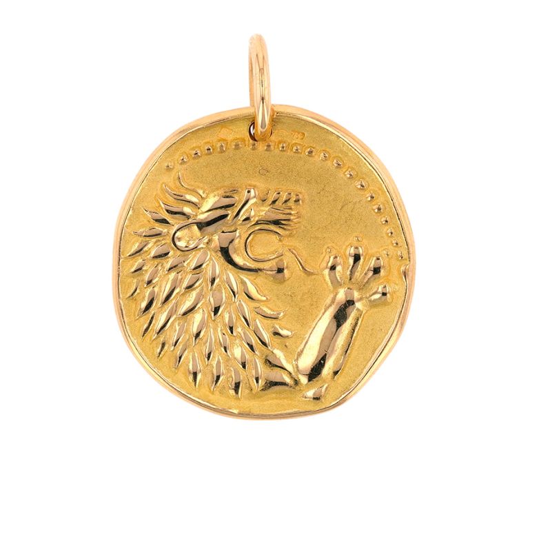 Lion medal in yellow gold...