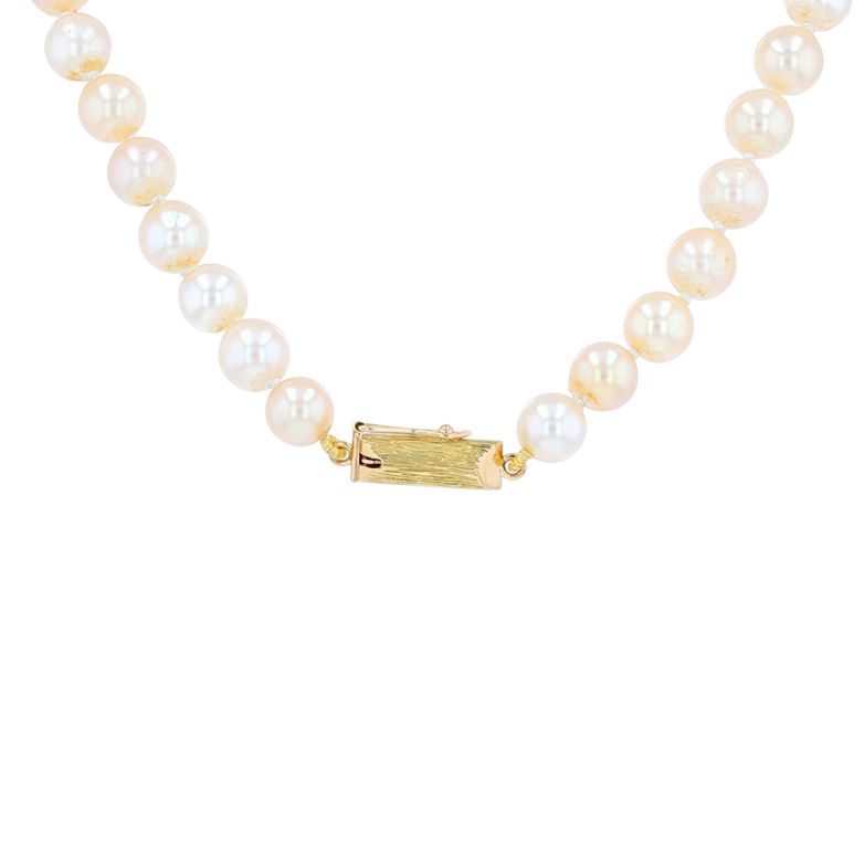 Yellow gold choker pearl...