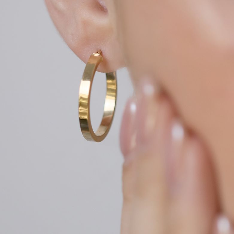 Yellow gold hoop earrings...