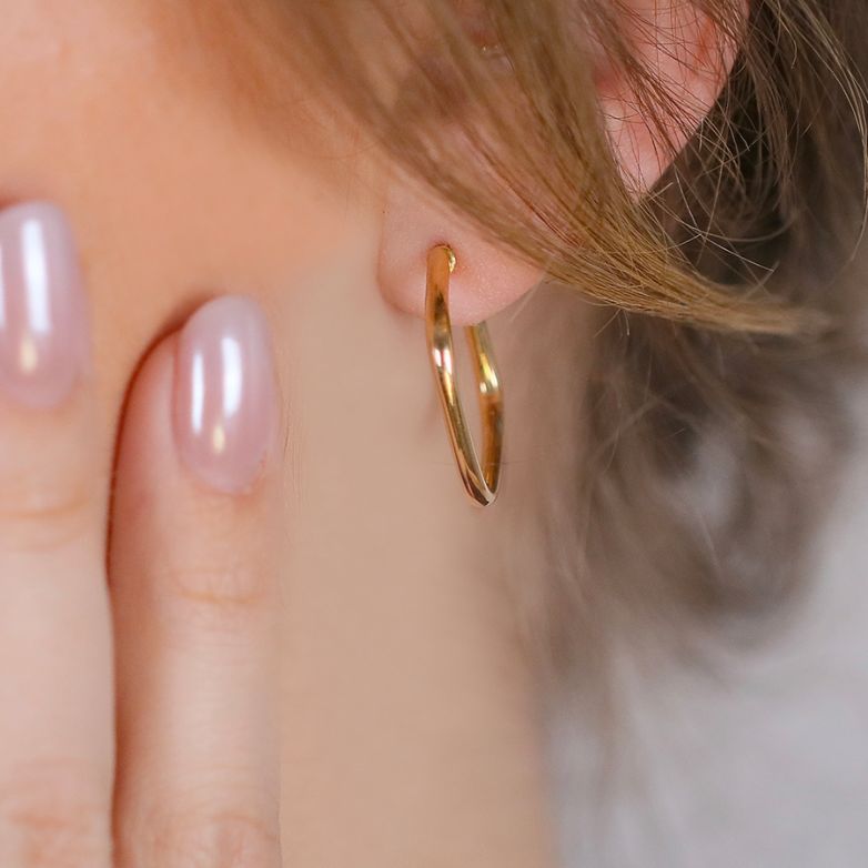 Yellow gold hoop earrings...