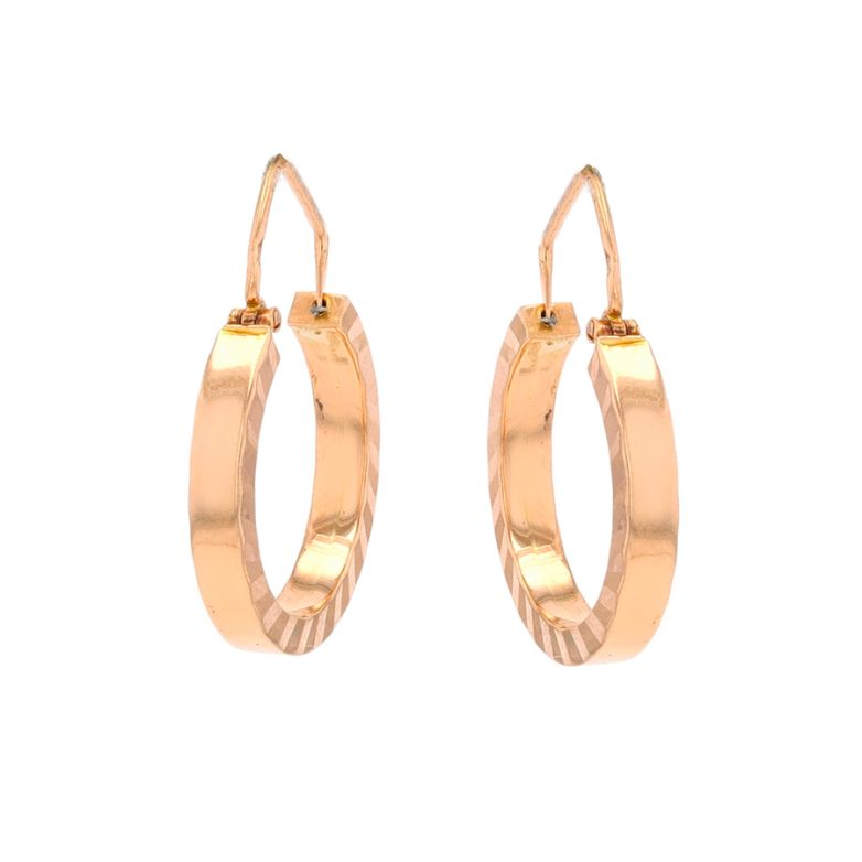 Yellow gold hoop earrings...