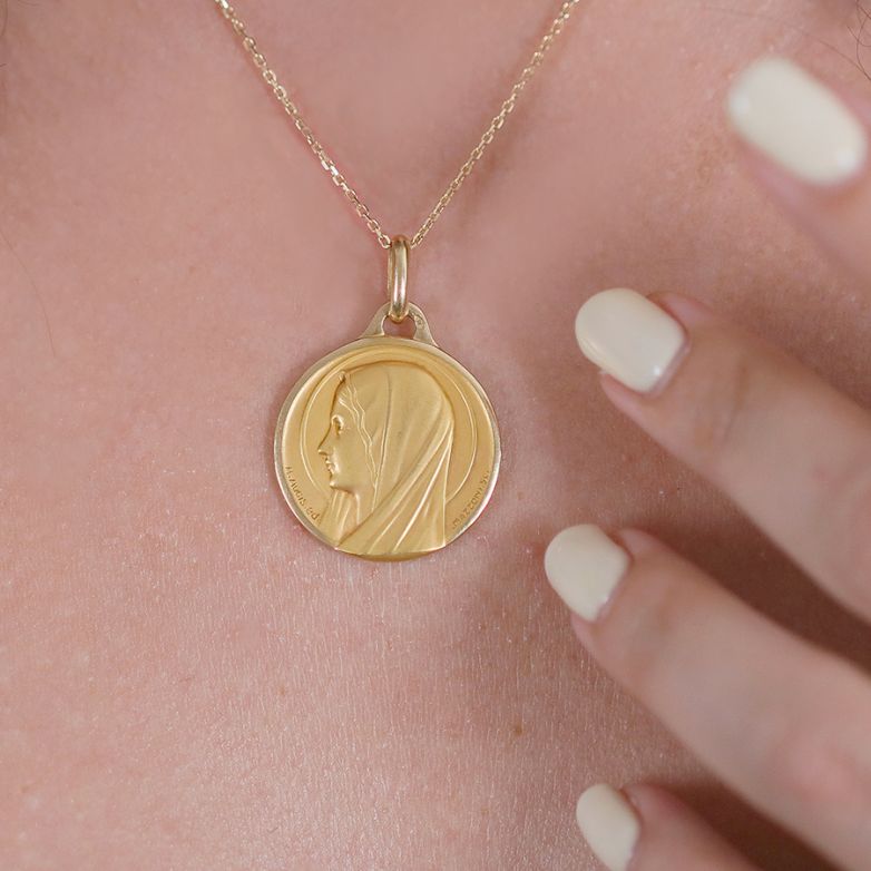 Vierge medal in yellow gold...