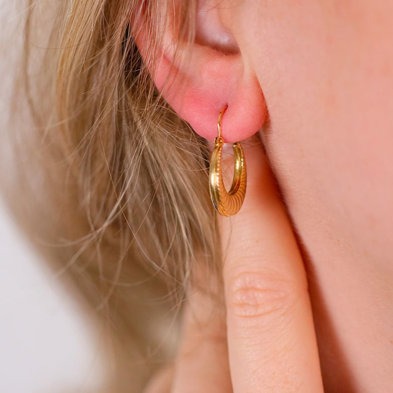 Yellow gold hoop earrings...