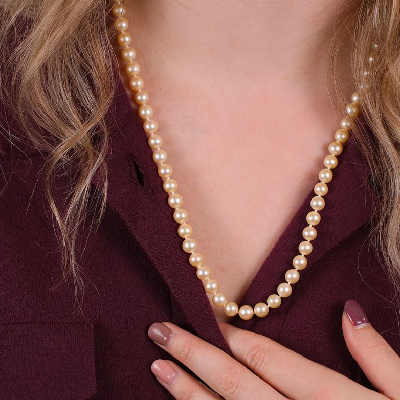 Yellow gold choker pearl...