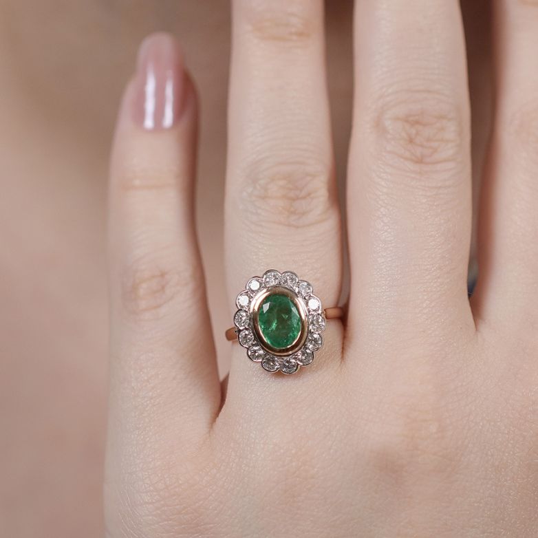 Bague marguerite émeraude...