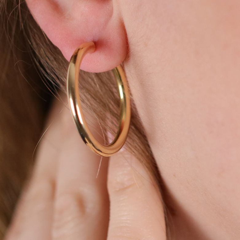 Yellow gold hoop earrings...