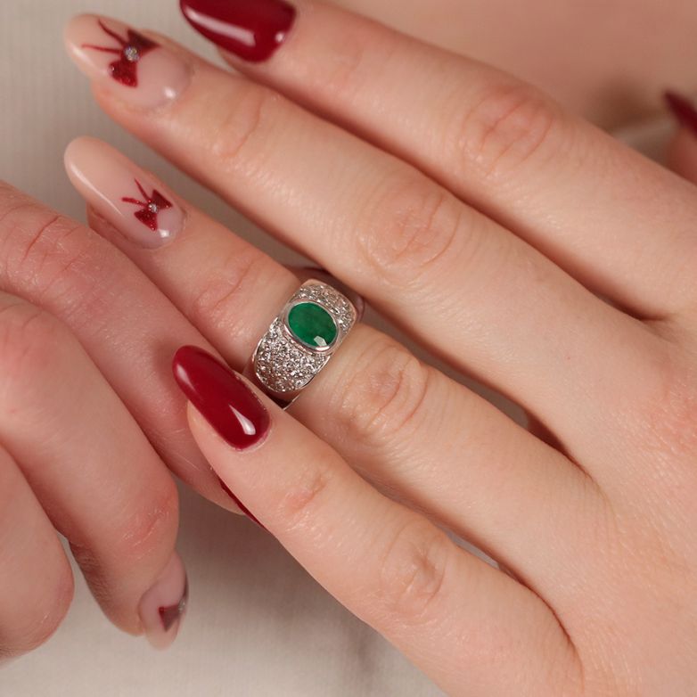 Ring emerald 0.60 carat and...