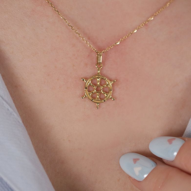 Rudder yellow gold pendant...