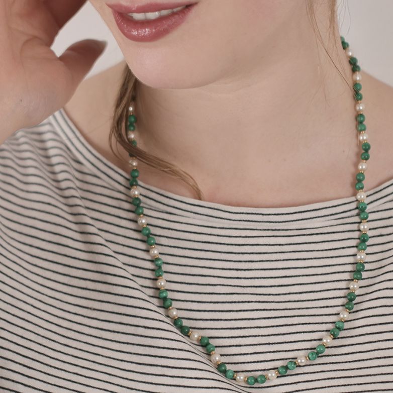 Cultured pearl and...