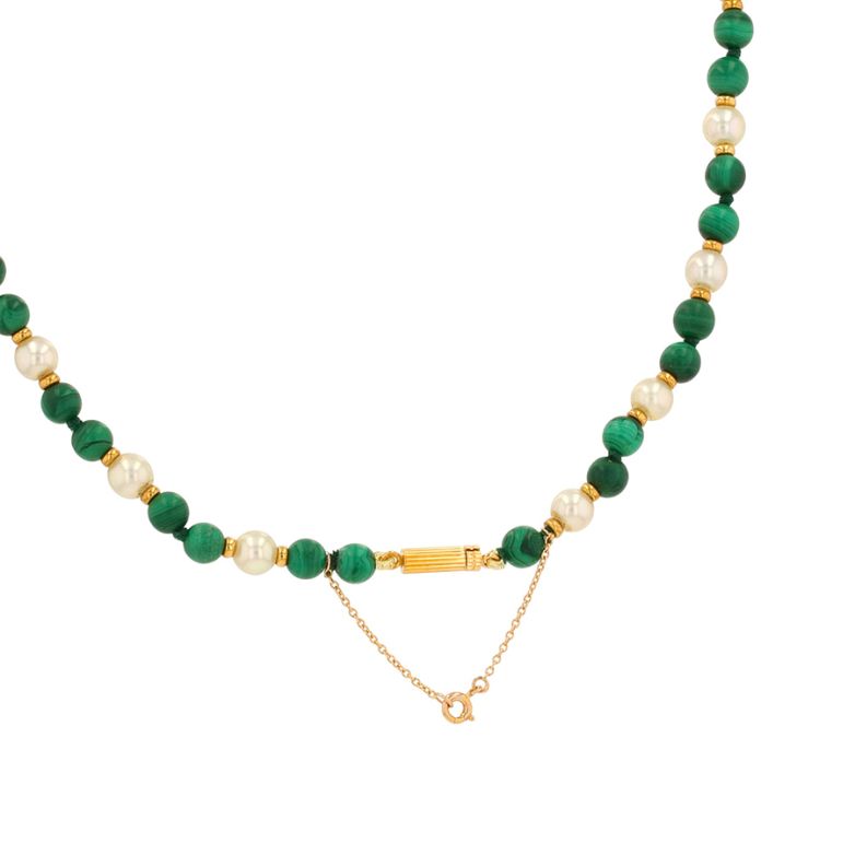 Cultured pearl and...