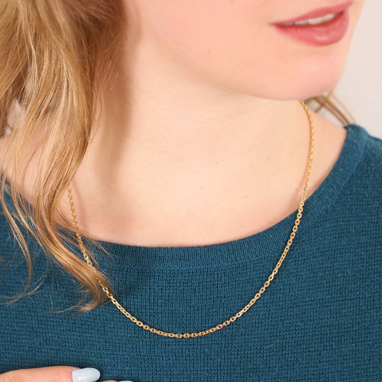 Yellow gold forçat chain...