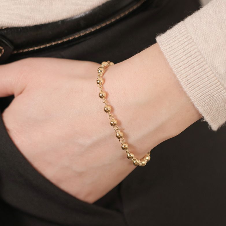Yellow gold ball link...