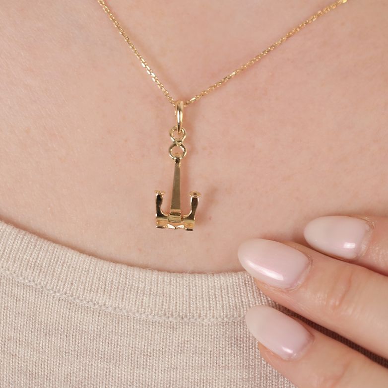 Yellow gold anchor pendant...
