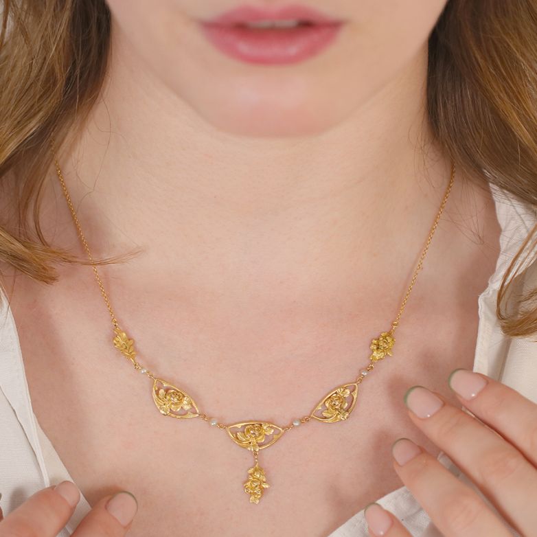 Yellow gold antique pearl...