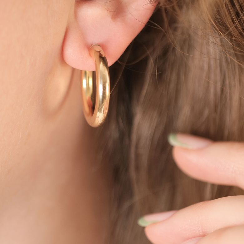 Yellow gold hoop earrings...