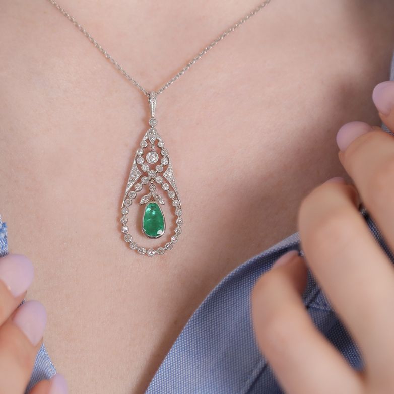 0.84 carat emerald and 0.45...