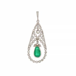 0.84 carat emerald and 0.45...