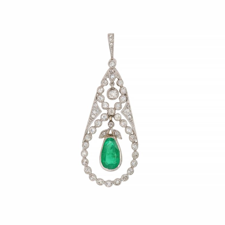 0.84 carat emerald and 0.45...