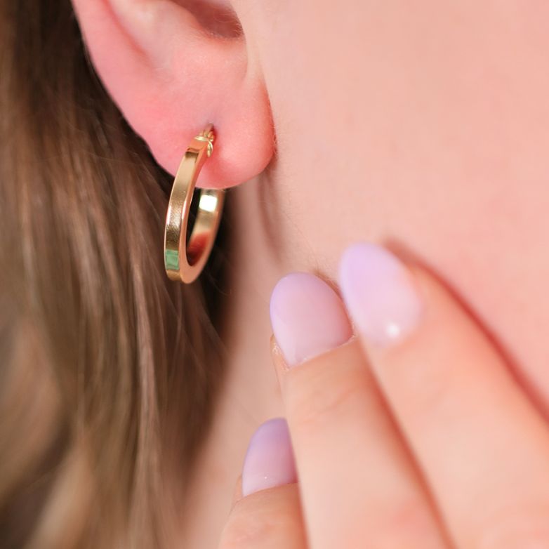 Yellow gold hoop earrings...
