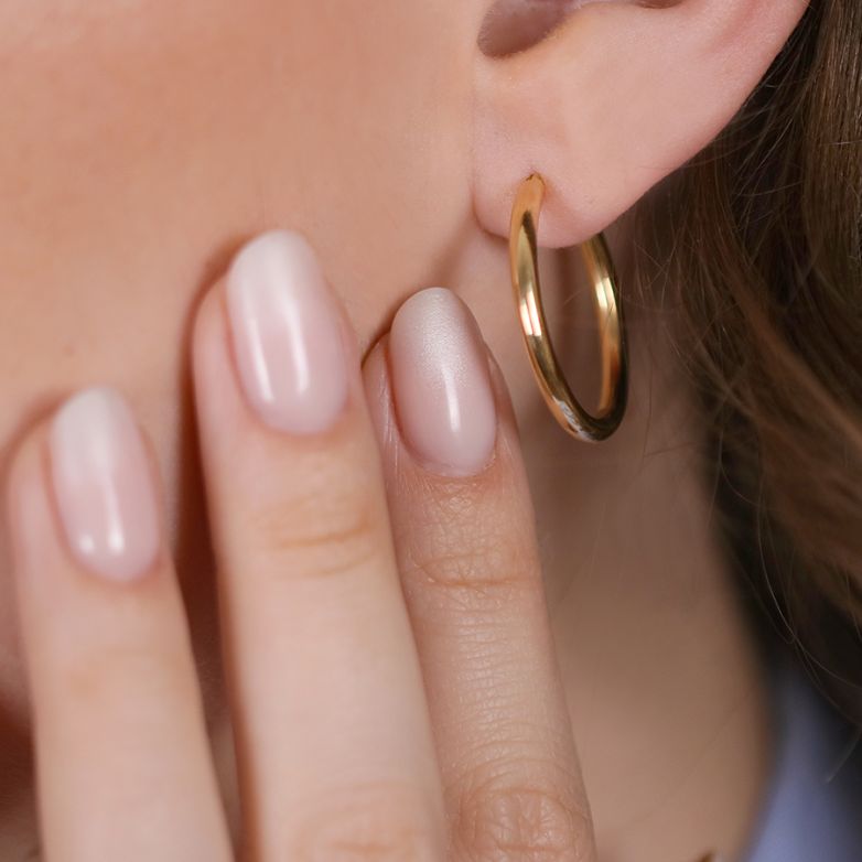 Yellow gold hoop earrings...