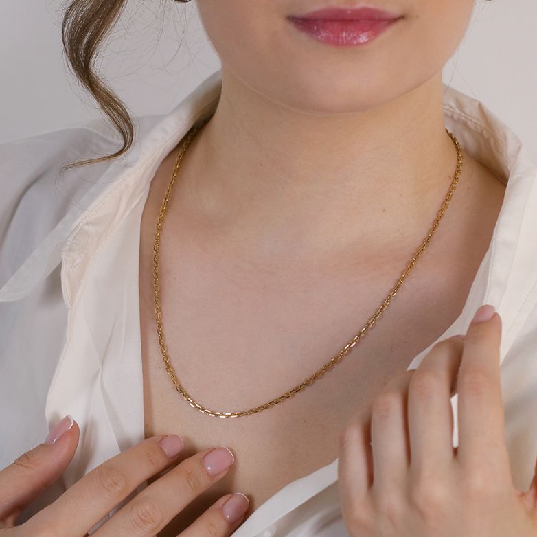 Yellow gold forçat chain...