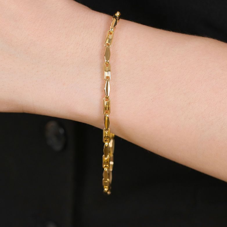 Yellow gold fancy link...