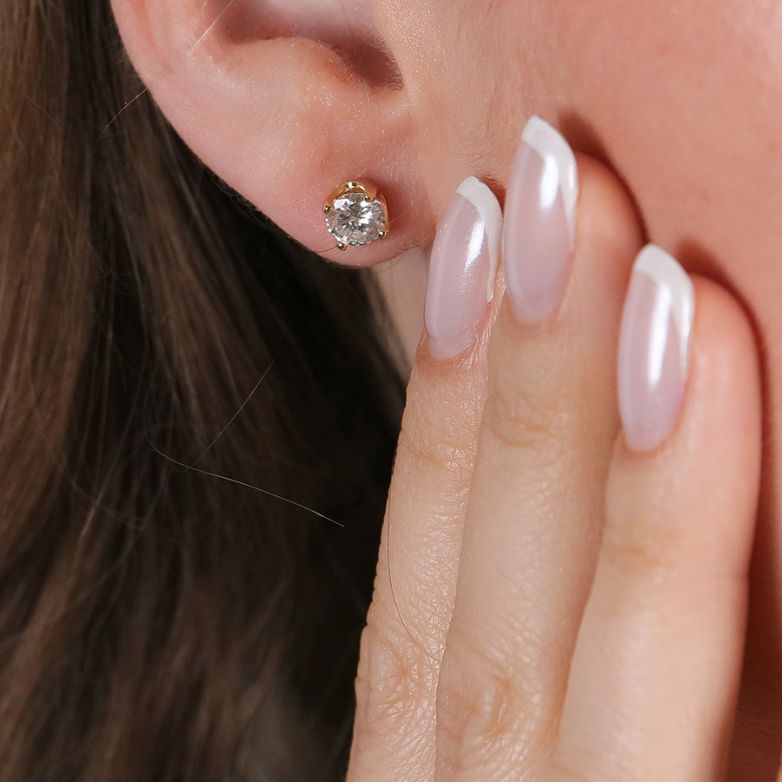 1.13-carat diamond earrings...