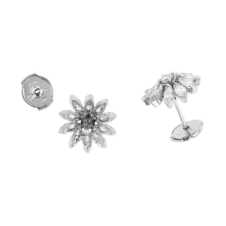 1.44-carat diamond earrings...