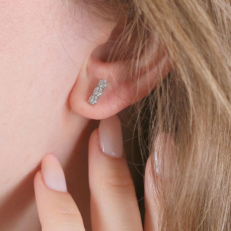 0.65-carat diamond earrings...